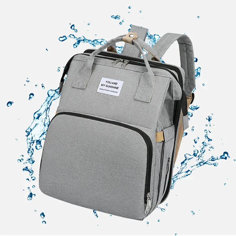 Mochila de maternidad versátil con cuna