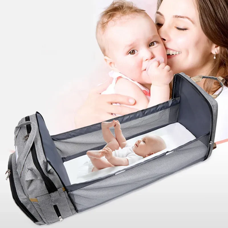 Mochila de maternidad versátil con cuna